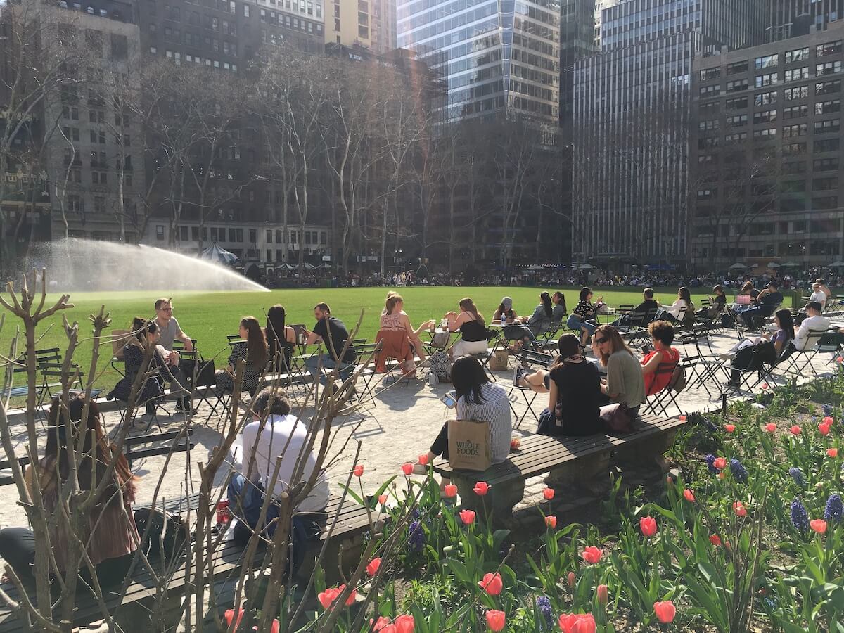 people conversing in bryant park NYC